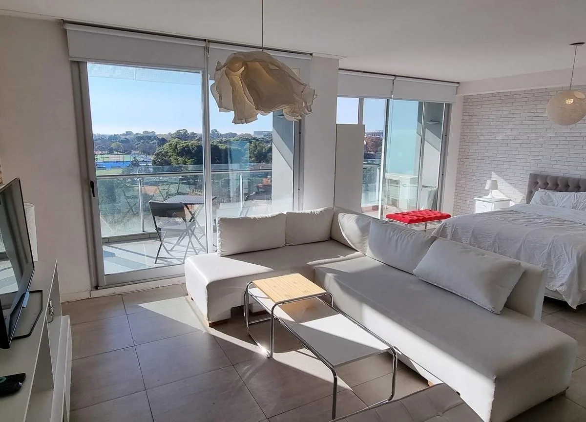 Furnished loft with balcony and river view