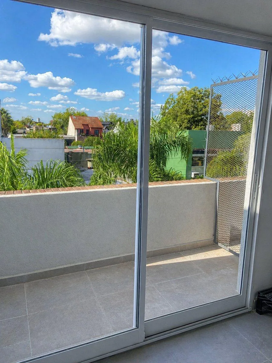 Loft doble altura con patio