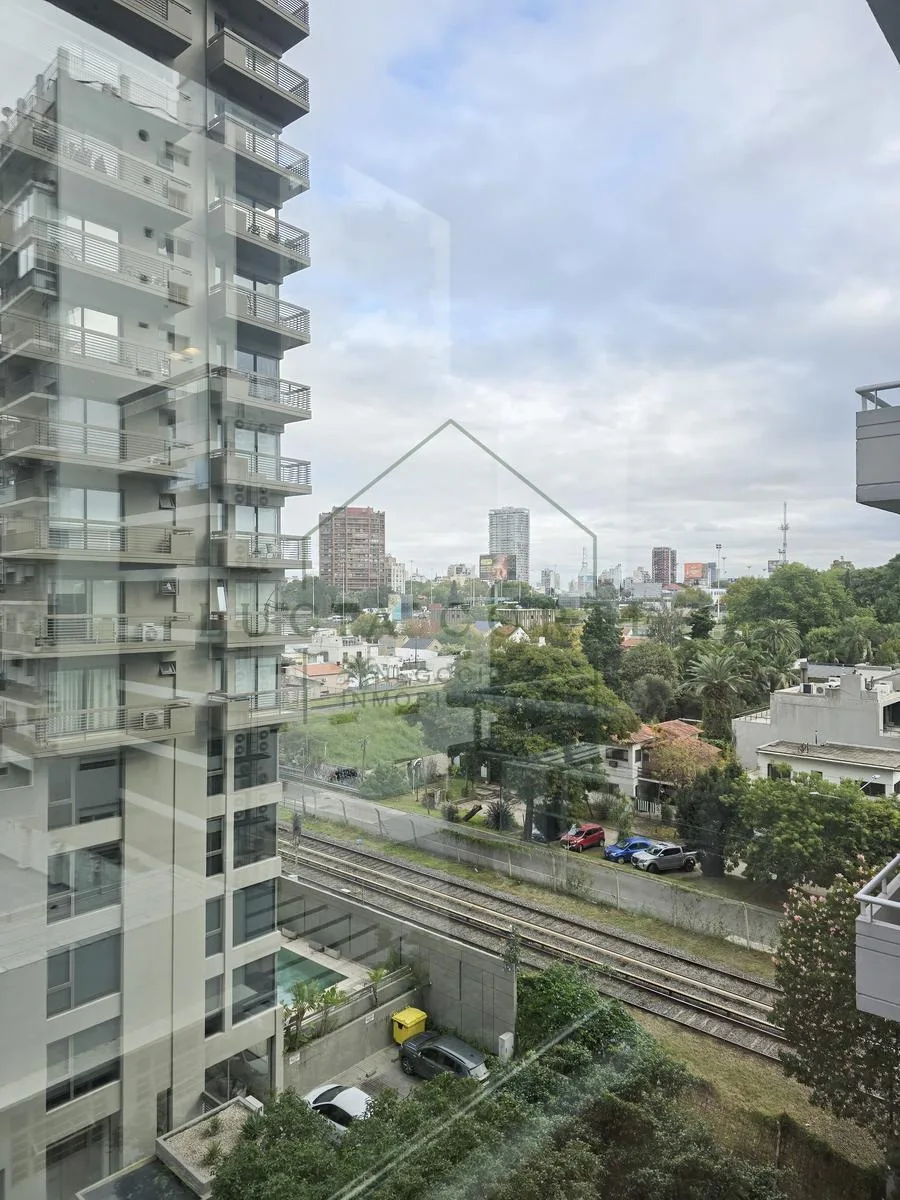 2 ambientes, balcón y cochera