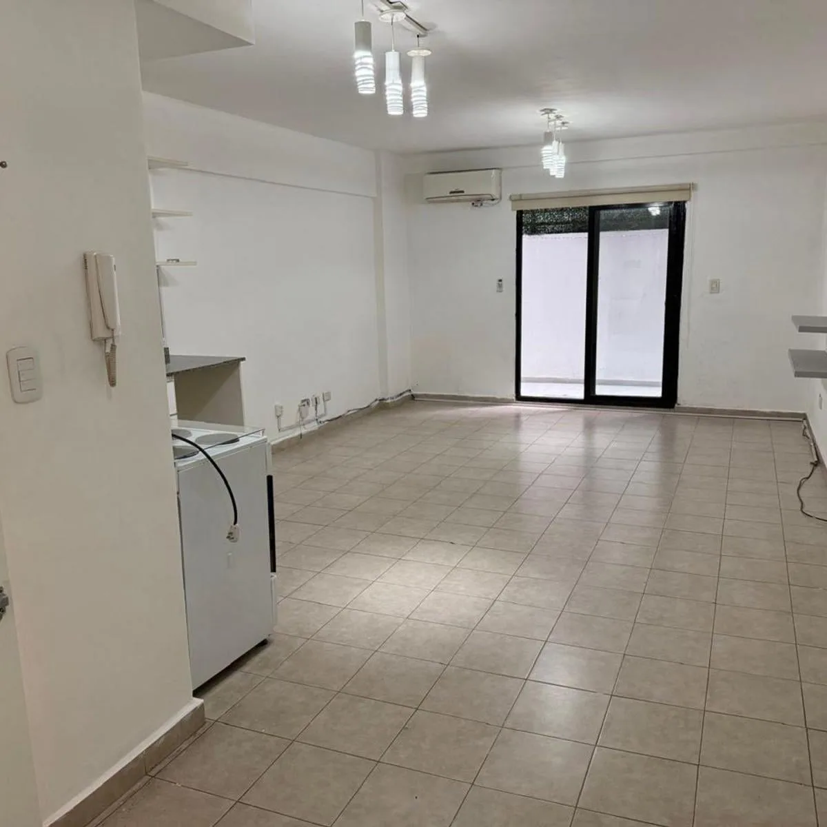 Studio com pátio, 1º andar