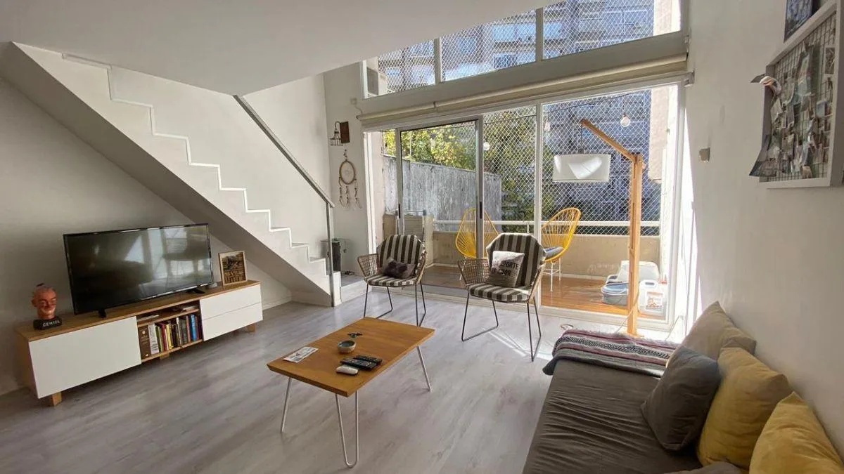 NE duplex with suite and patio