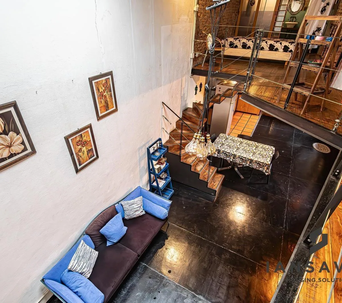 Double-height furnished loft