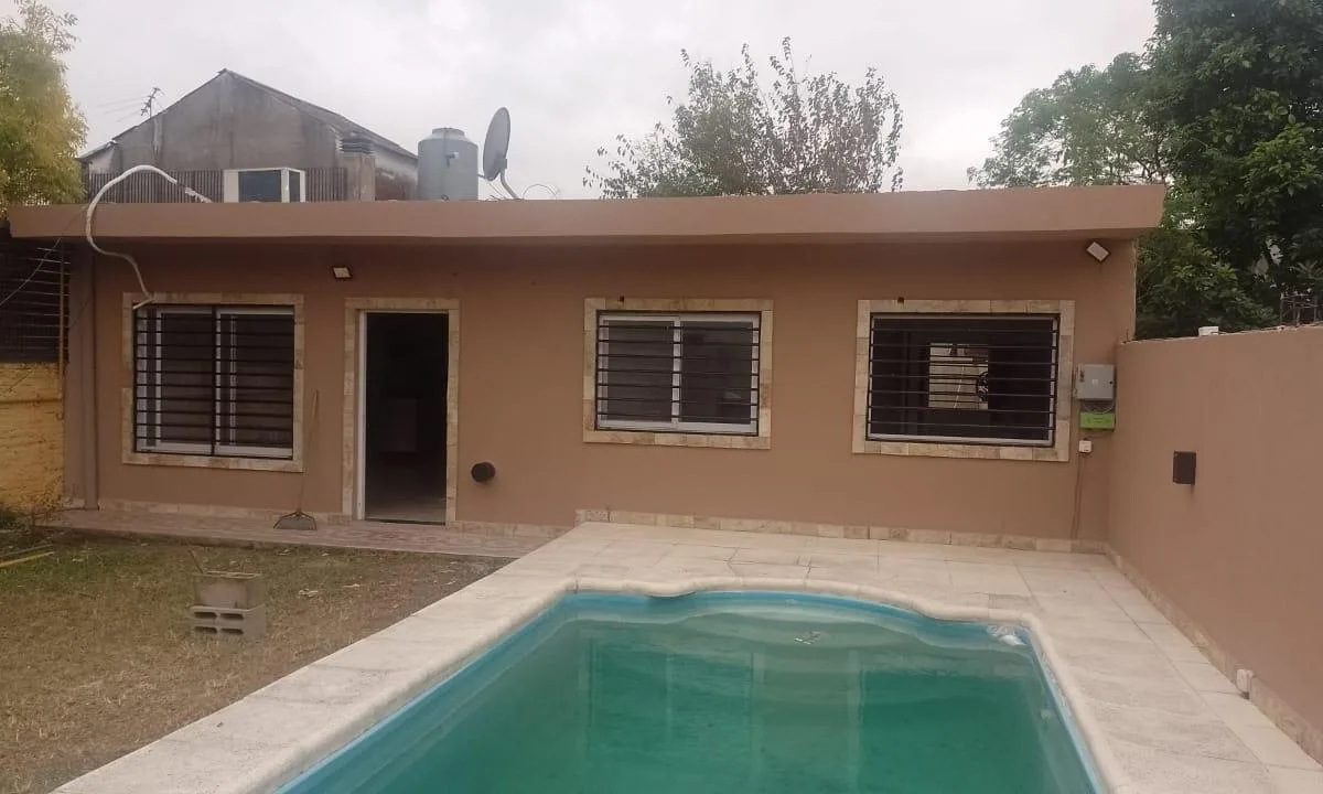 House with pool and grill