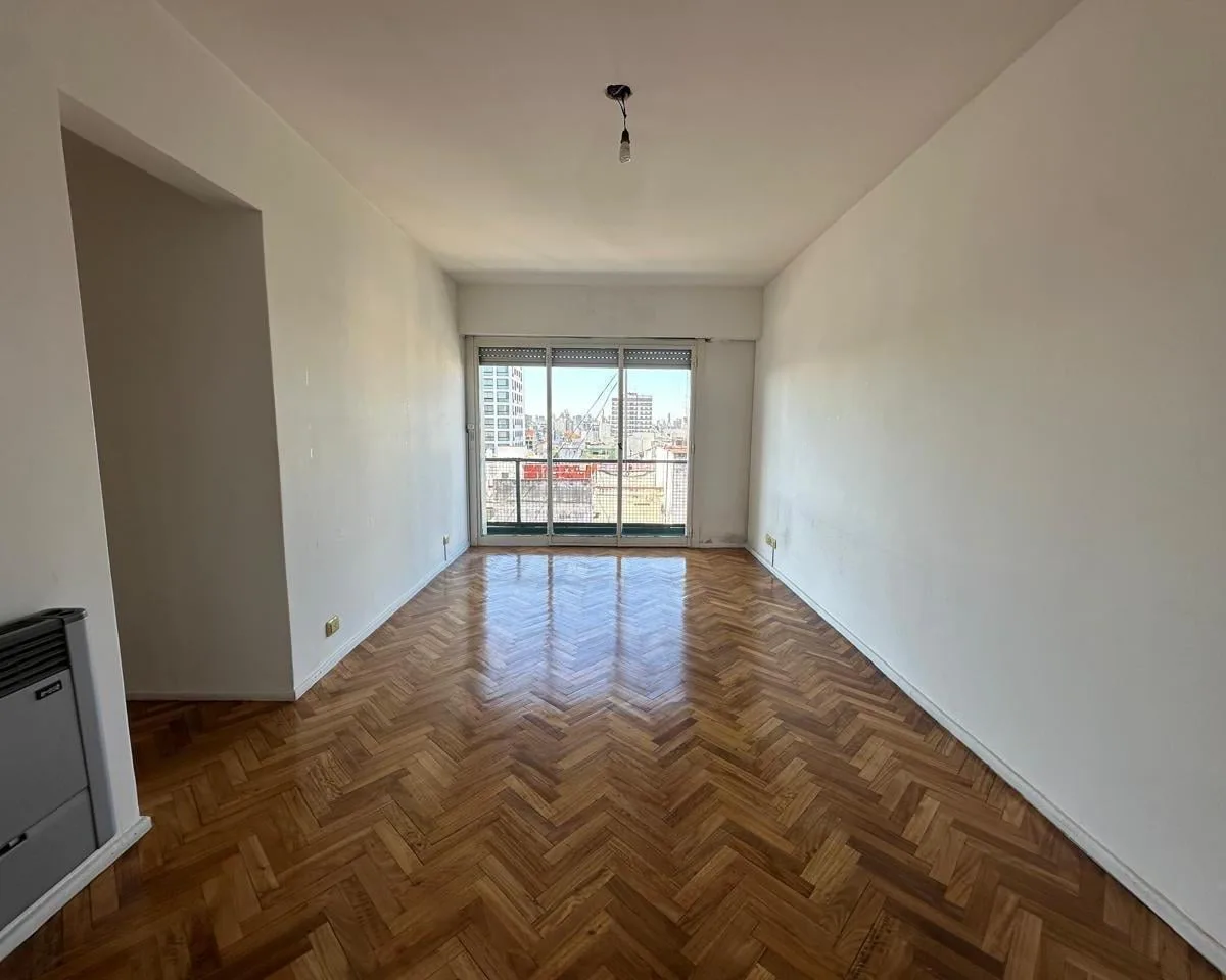 Piso 11 con balcón corrido