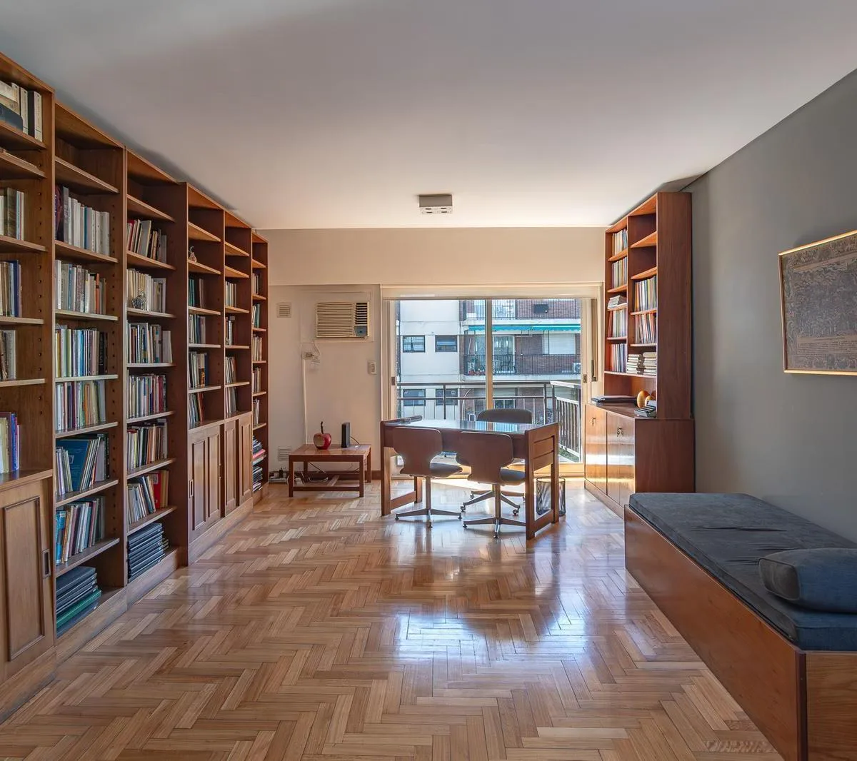 Studio with balcony and library