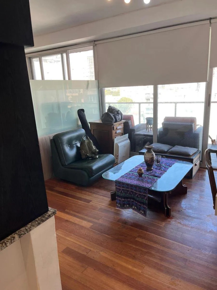 Monoambiente con balcón y gimnasio