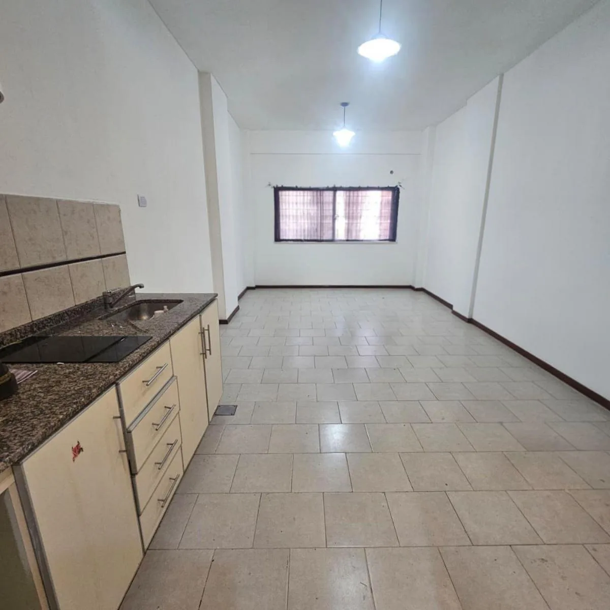 Monoambiente con terraza y parrilla