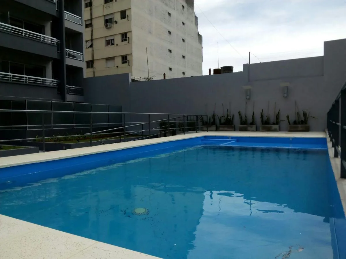 Studio com varanda e piscina