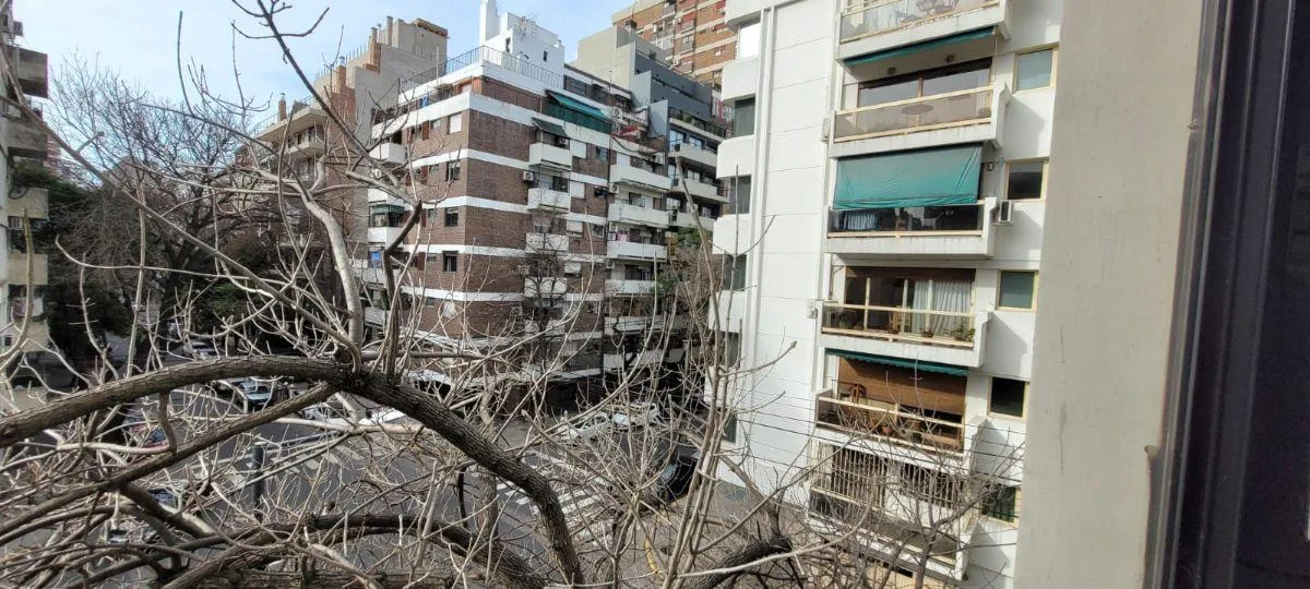 Monoambiente con balcón vidriado
