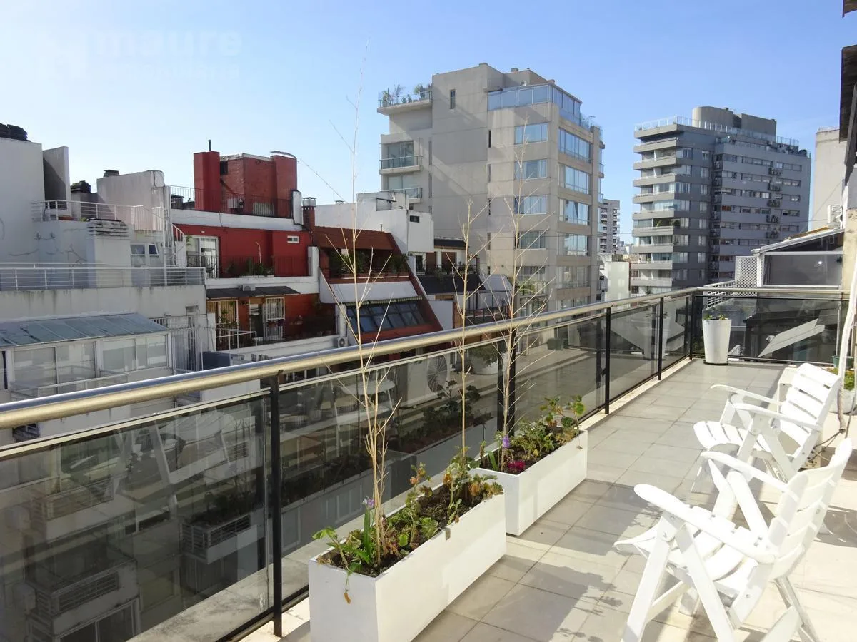 Monoambiente con balcón terraza
