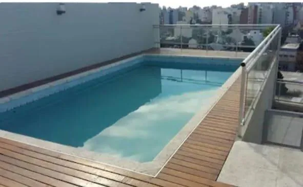 Estúdio mobiliado com piscina