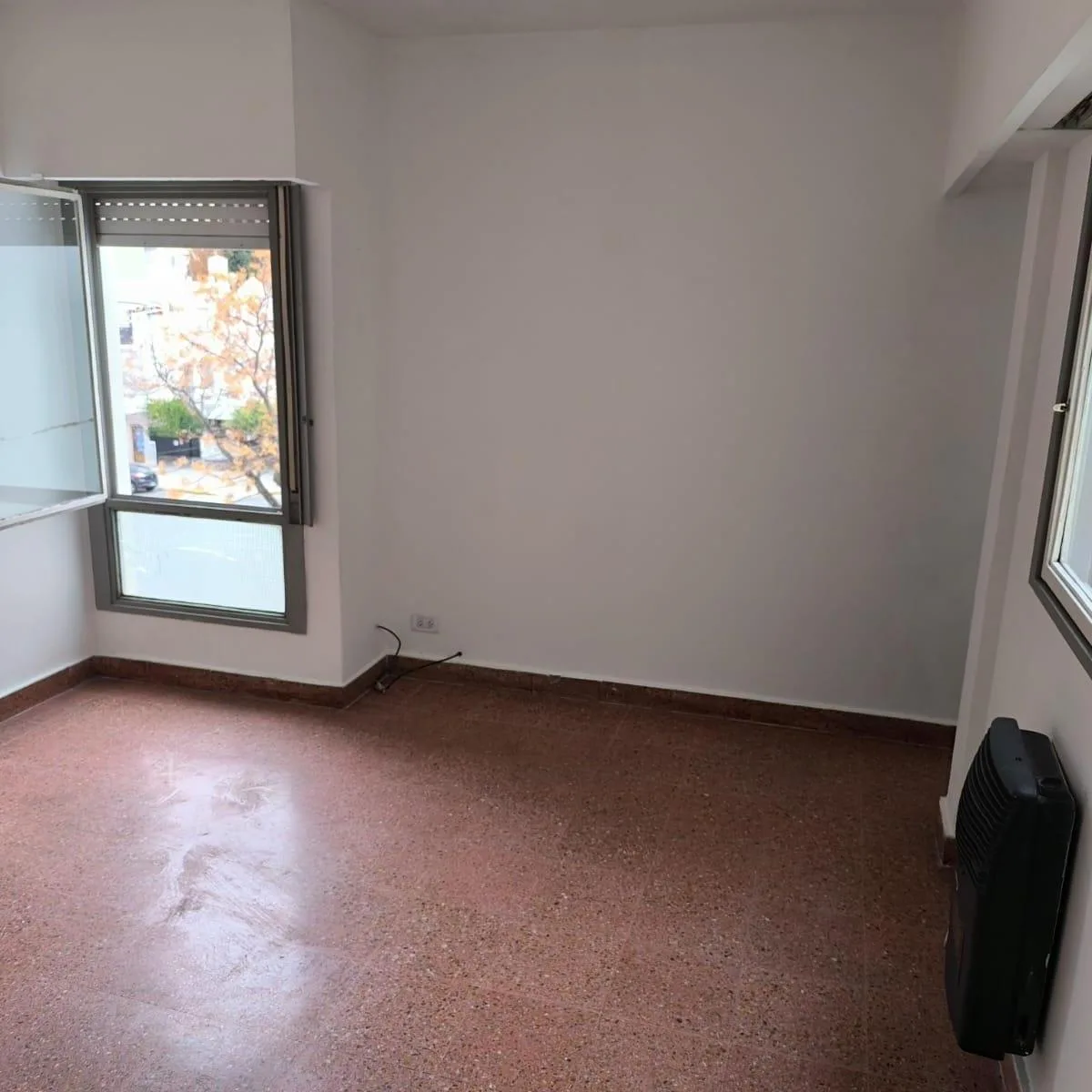 2 ambientes con terraza común