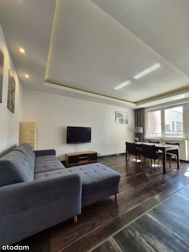 Apartament z balkonem, widok na patio, garaż podziemny, komórka lok