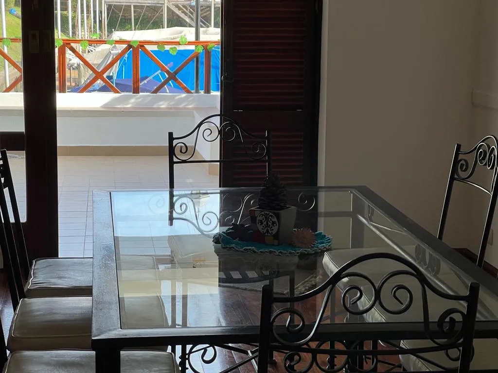 Two-bedroom ground-floor apartment in Victoria with river-facing terrace