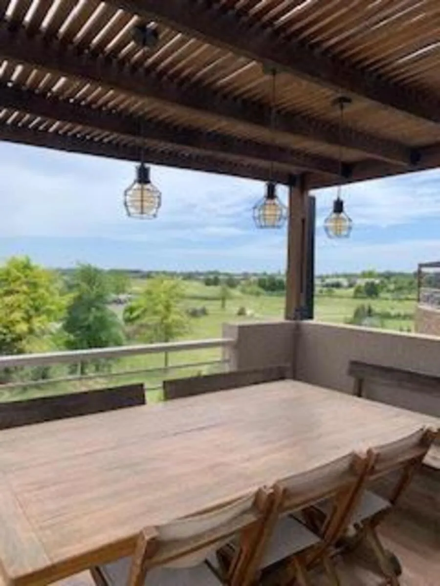 Apartamento de 1 dormitório com vista para o campo de golfe em Tigre