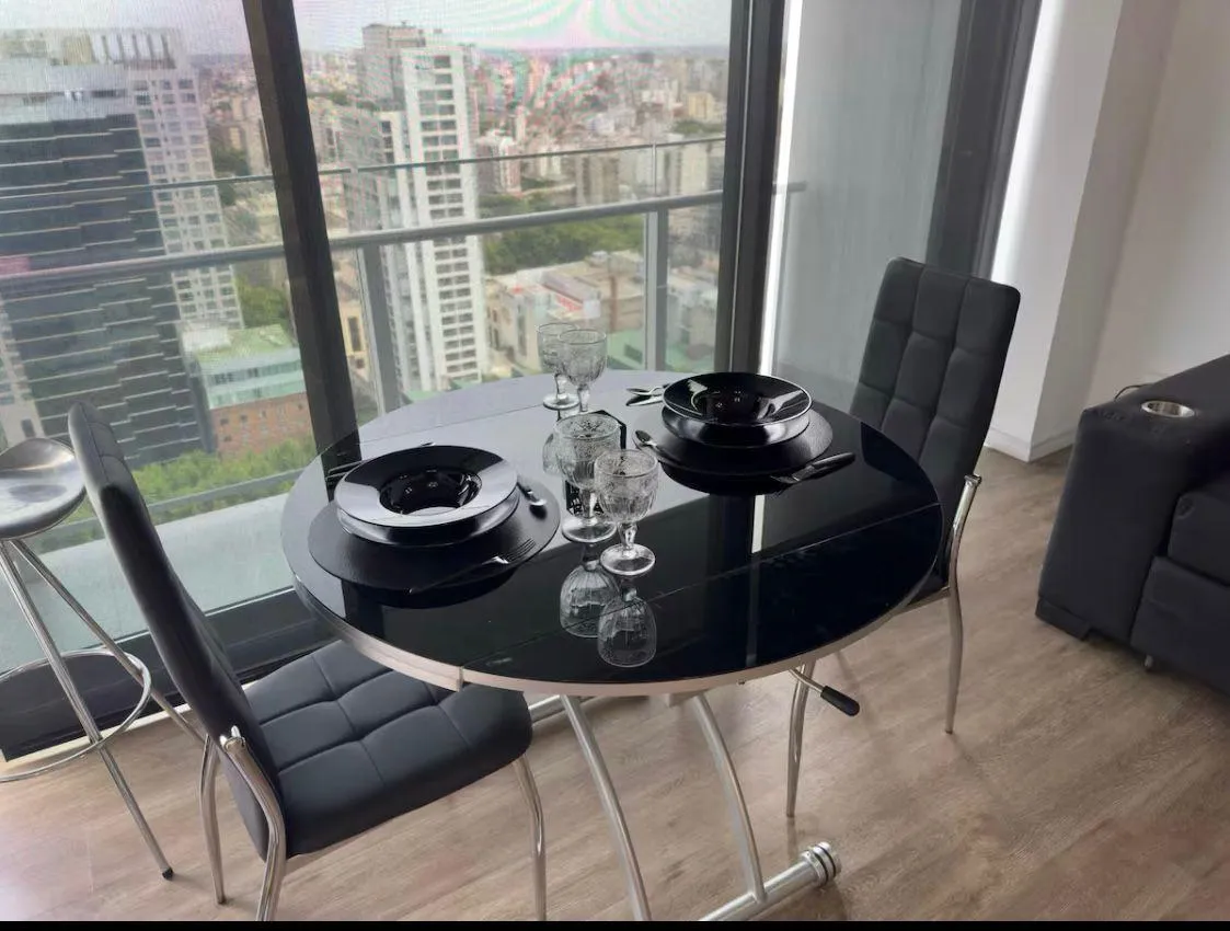 Квартира-студия на высоком этаже с видом на реку в Puerto Madero