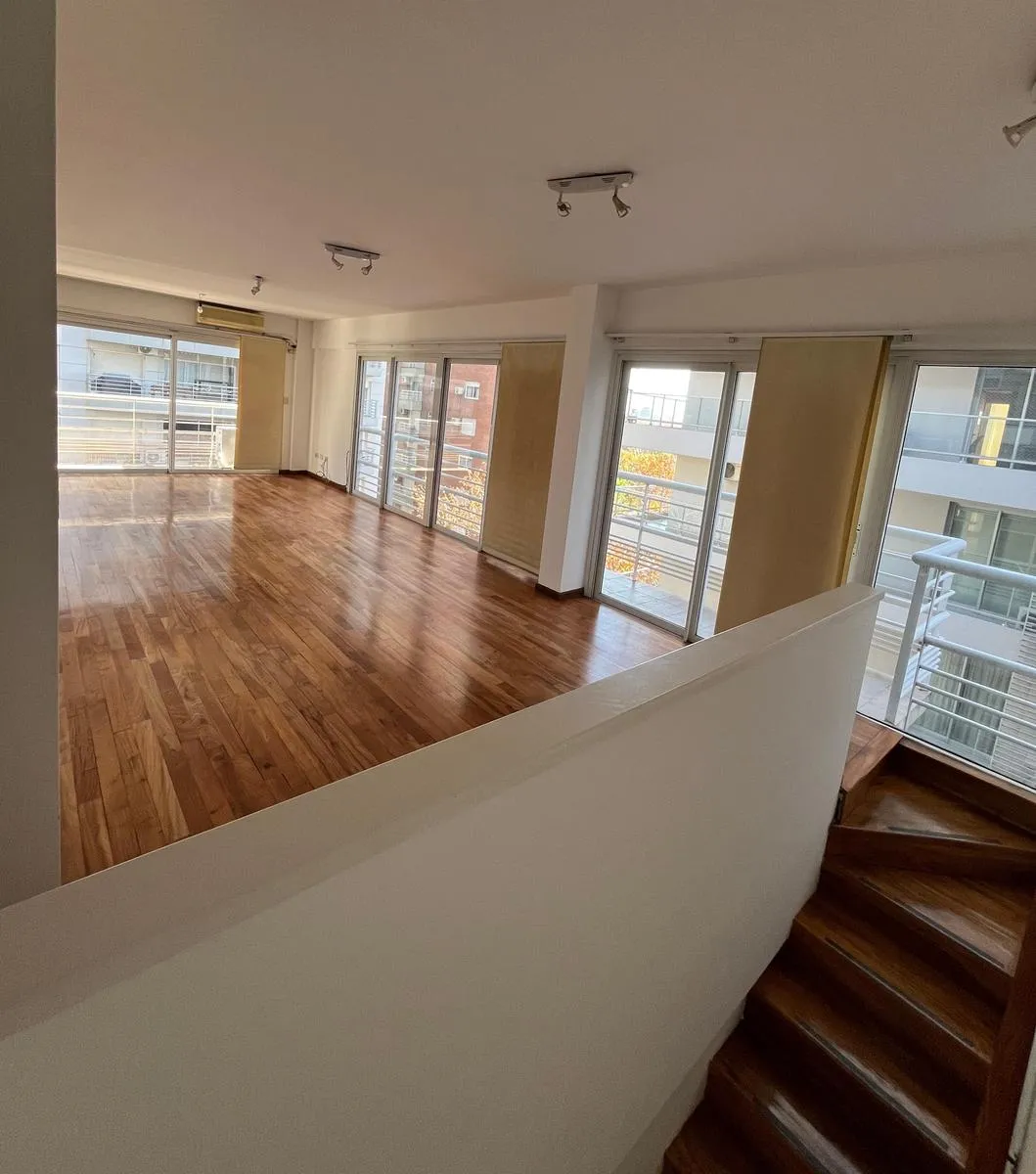 Three-bedroom duplex apartment with service room and parking in Vicente López