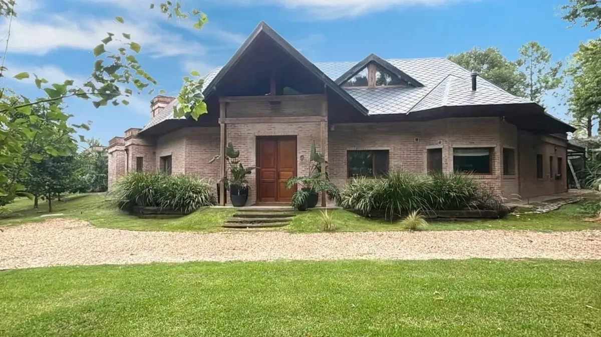 Casa com 3 dormitórios para alugar em Ituzaingó