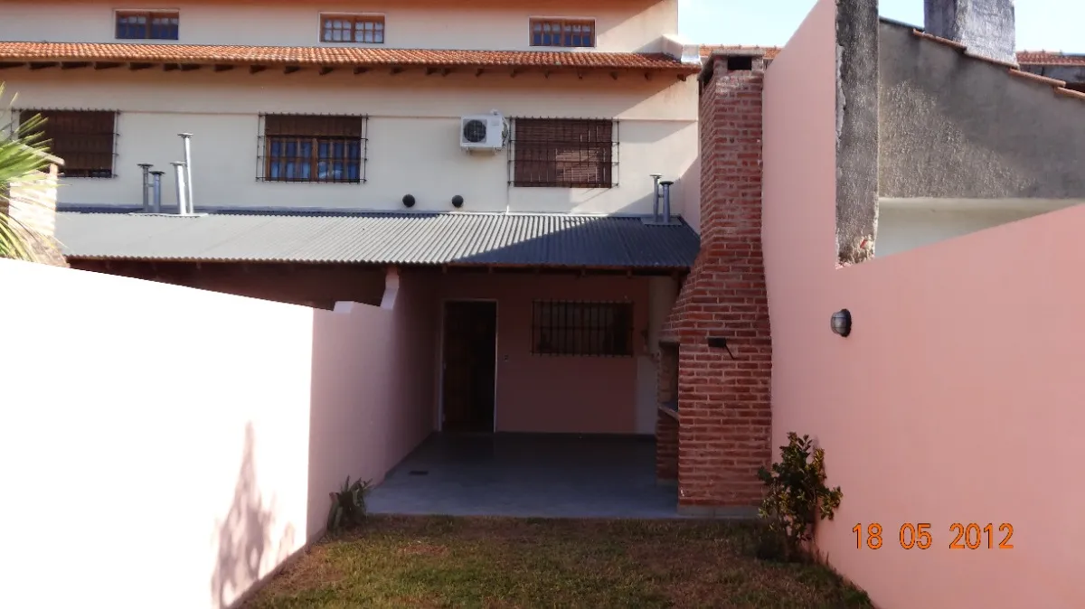 Duplex with parking and grill