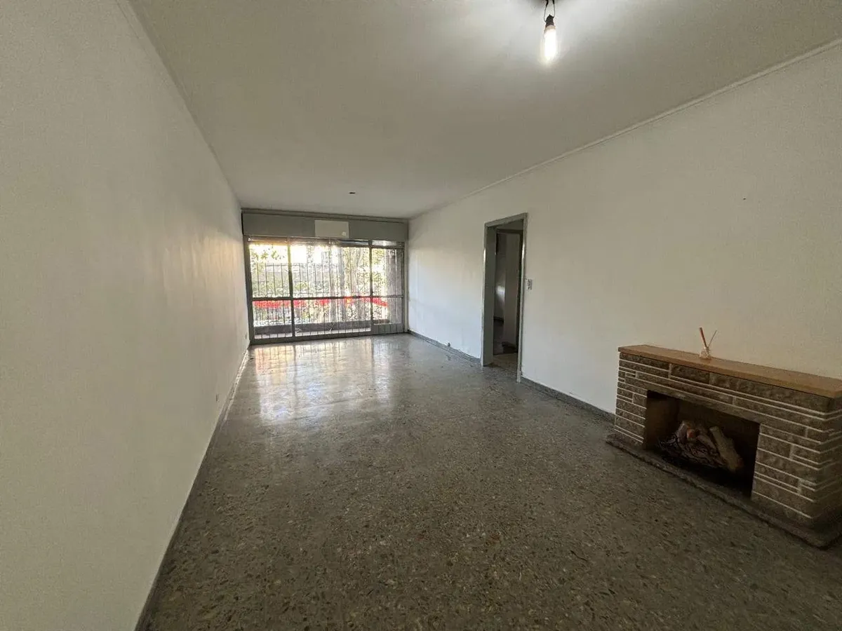 1st-floor unit with front balcony