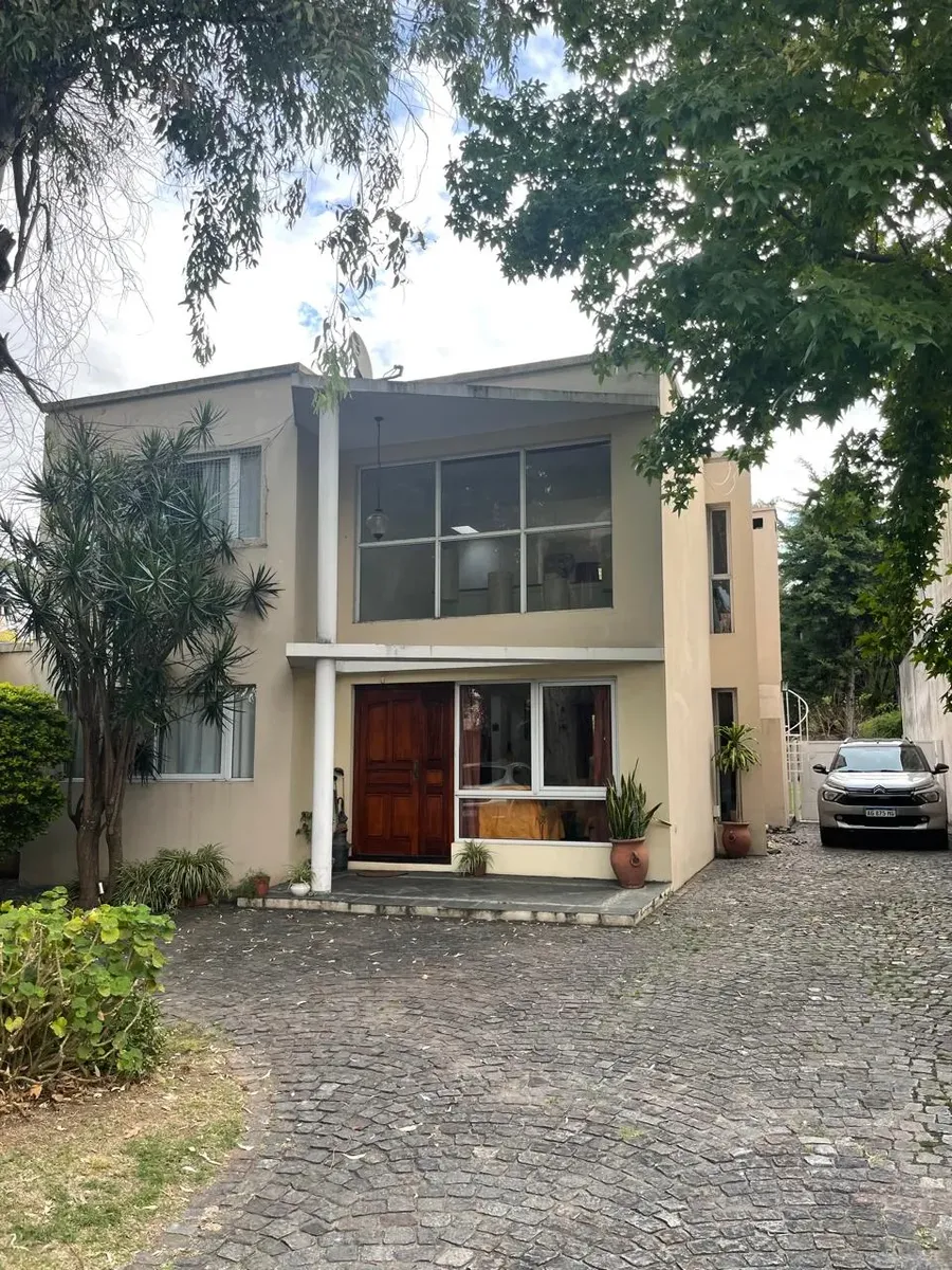 House in gated community with garden