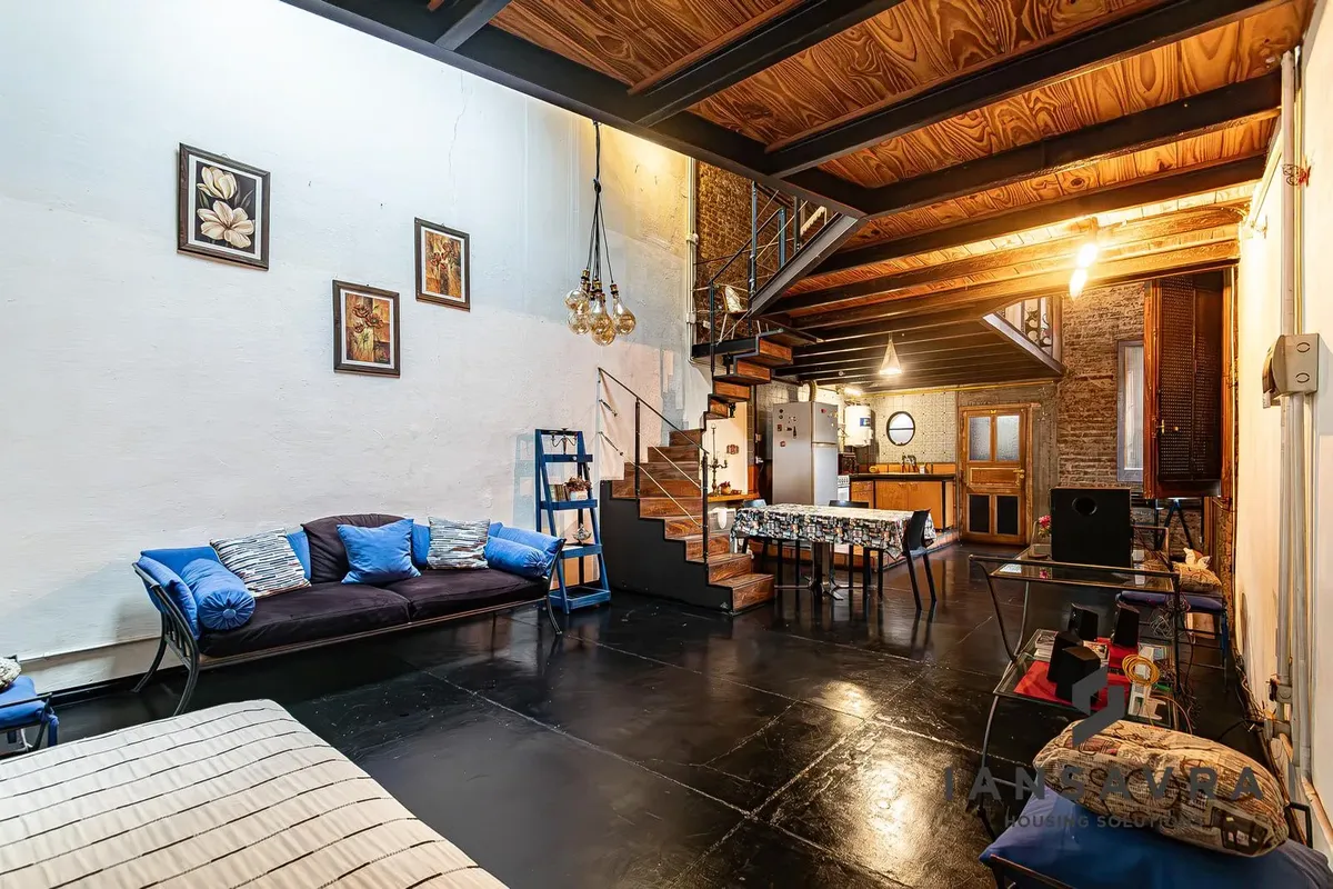 Double-height furnished loft