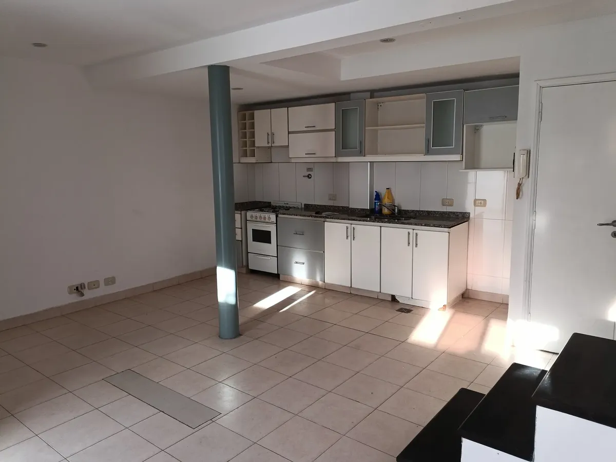 Upper-floor duplex with patio