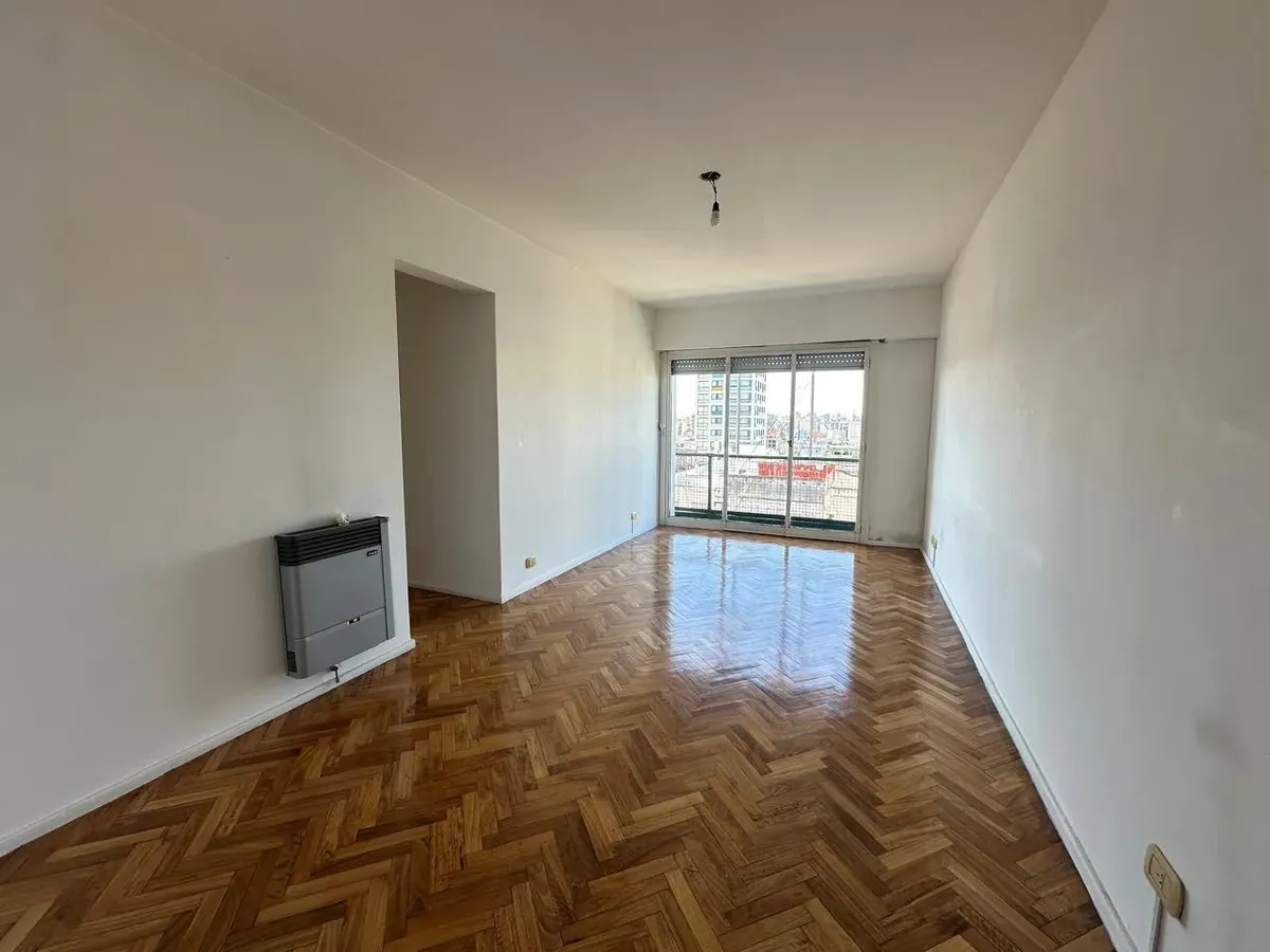 Piso 11 con balcón corrido