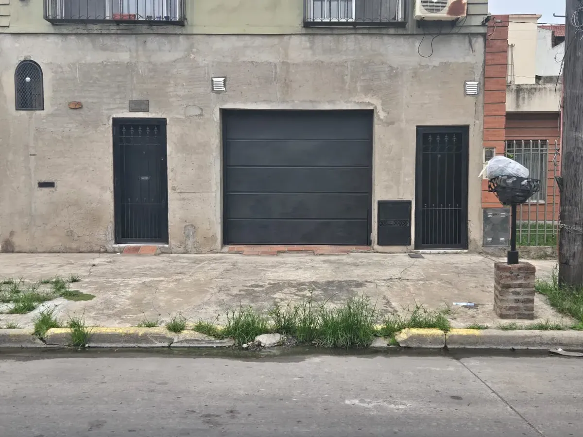 House with garage and grill