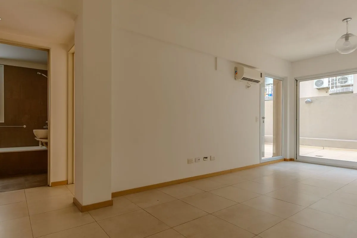 Apartamento de dois ambientes com varanda-terraço e vaga de garagem em Chacarita