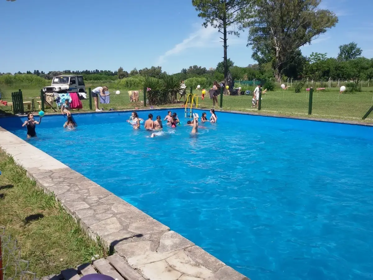 Apartment rental in Pilar with event hall, cabins and pool