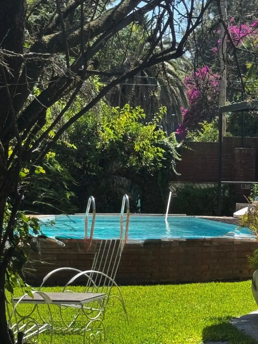 Casa-quinta para temporada em Ituzaingó com 3 dormitórios
