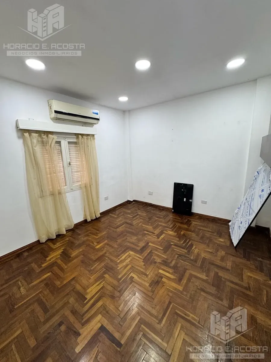 Apartamento de três ambientes com 2 dormitórios em General San Martín (Centro)