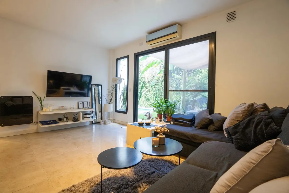 Unfurnished two-bedroom PH apartment with private garden, pool and grill in Villa Urquiza