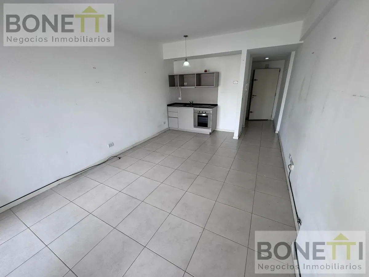 Kitnet de um ambiente com varanda em Caballito