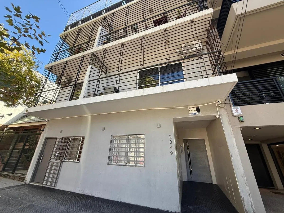 Subdivided studio apartment with two balconies in Núñez