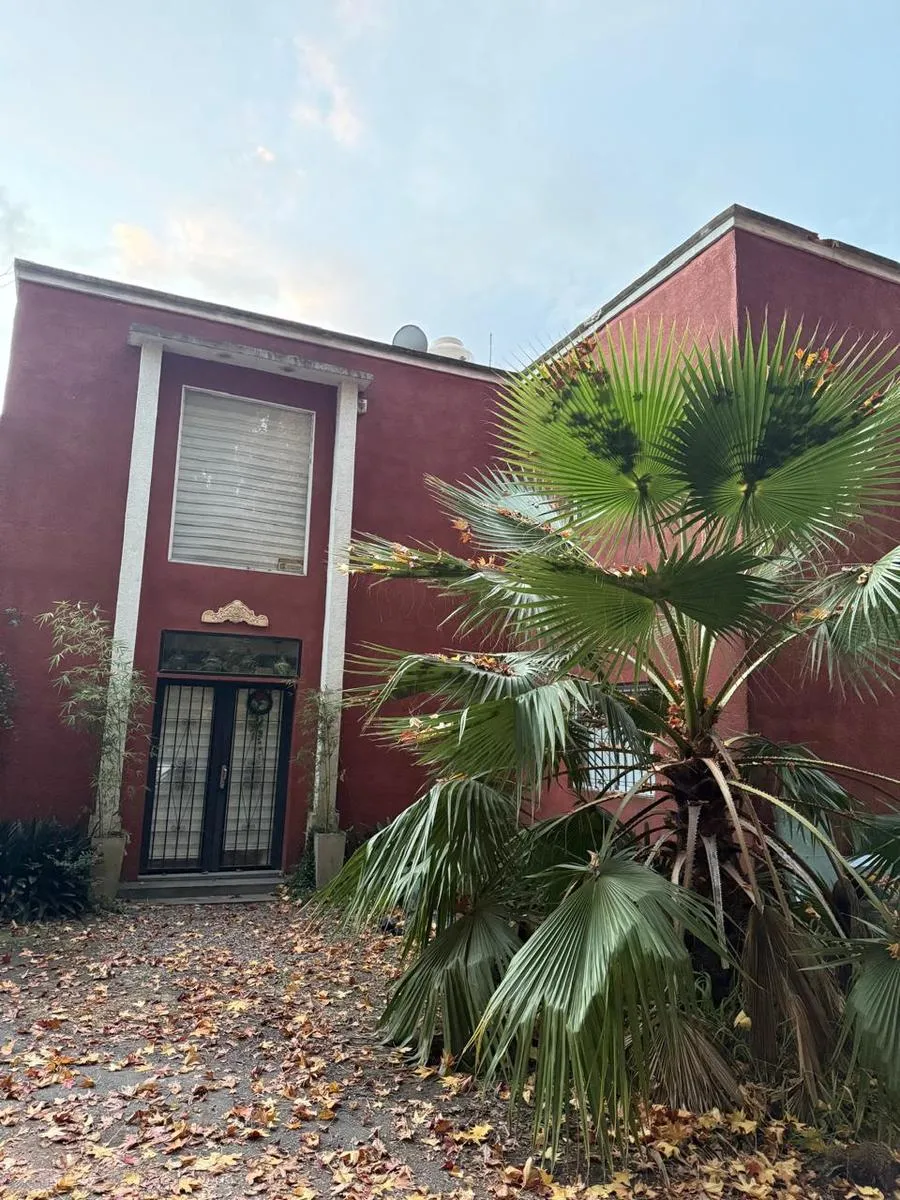 House with garden and grill
