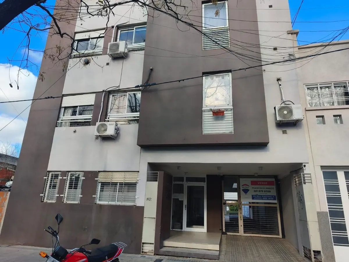 Duplex with parking and desk