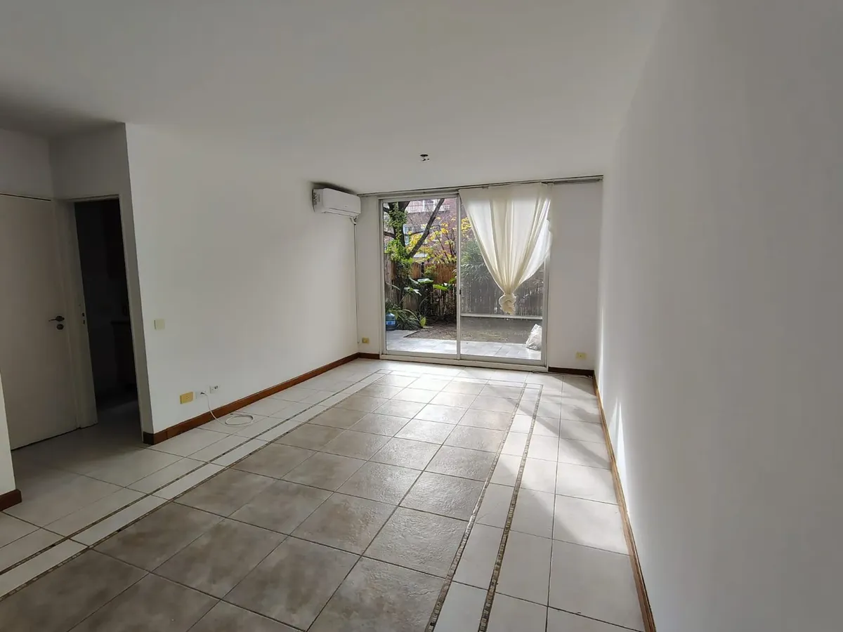 Dúplex con jardín y cochera
