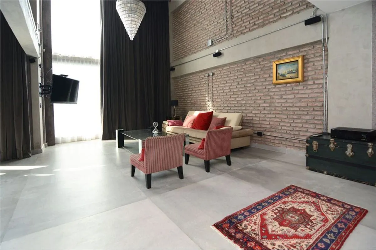 Loft con balcón corrido