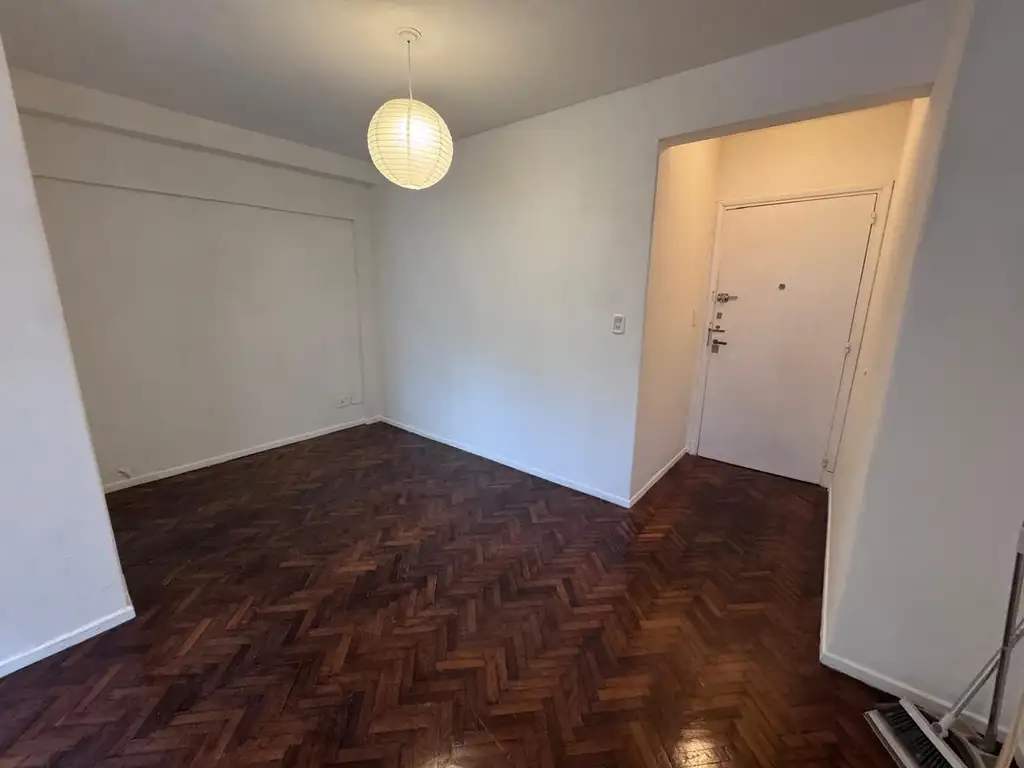 Monoambiente en L con cocina independiente