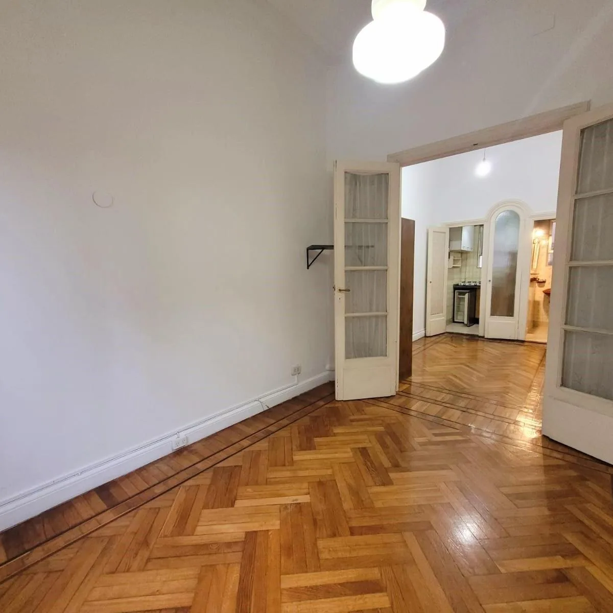 Divided studio with built-in closet