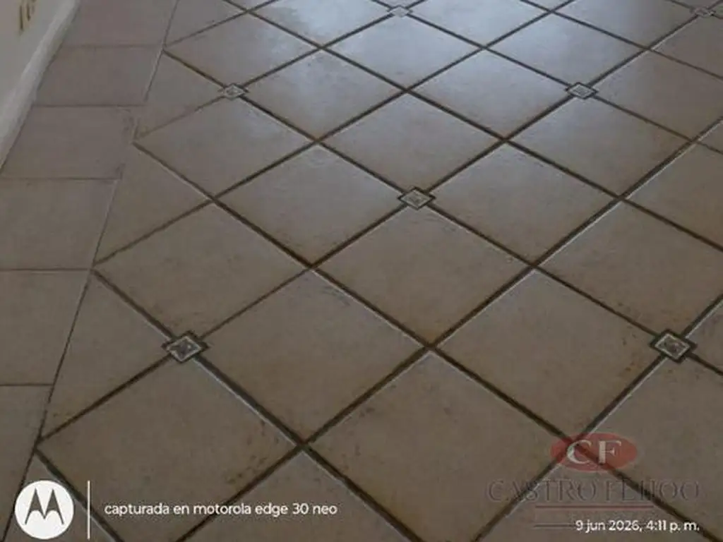 Departamento con balcón cerrado