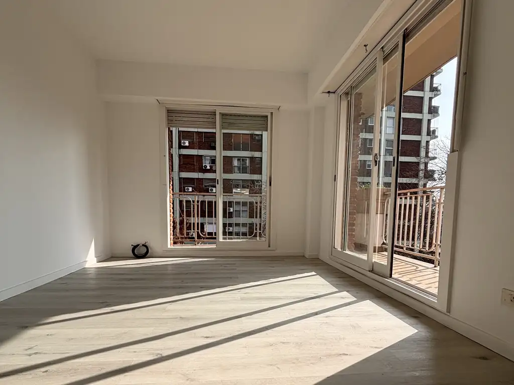 Studio with L-shaped balcony