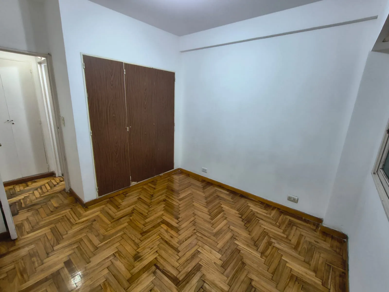 Bathroom with shower and tiles