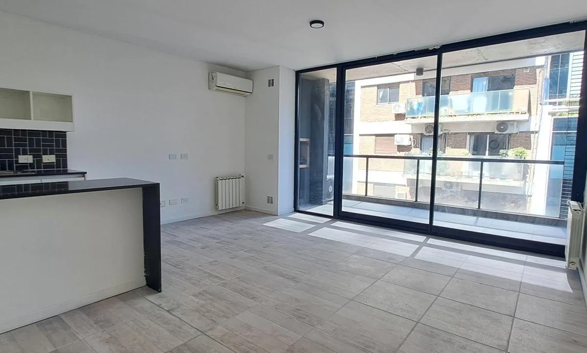 2 ambientes con balcón y cochera