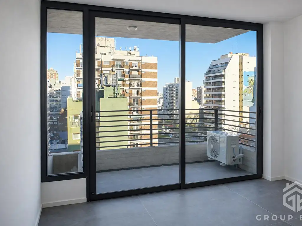 Monoambiente con balcón terraza