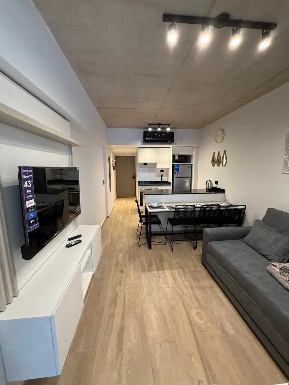 Furnished studio with balcony, living_room