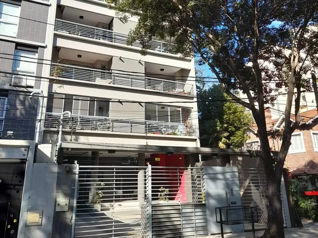 Varanda com churrasqueira e vaga