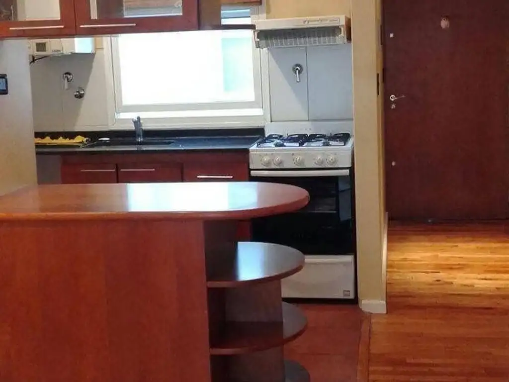 Departamento en planta baja con balcón